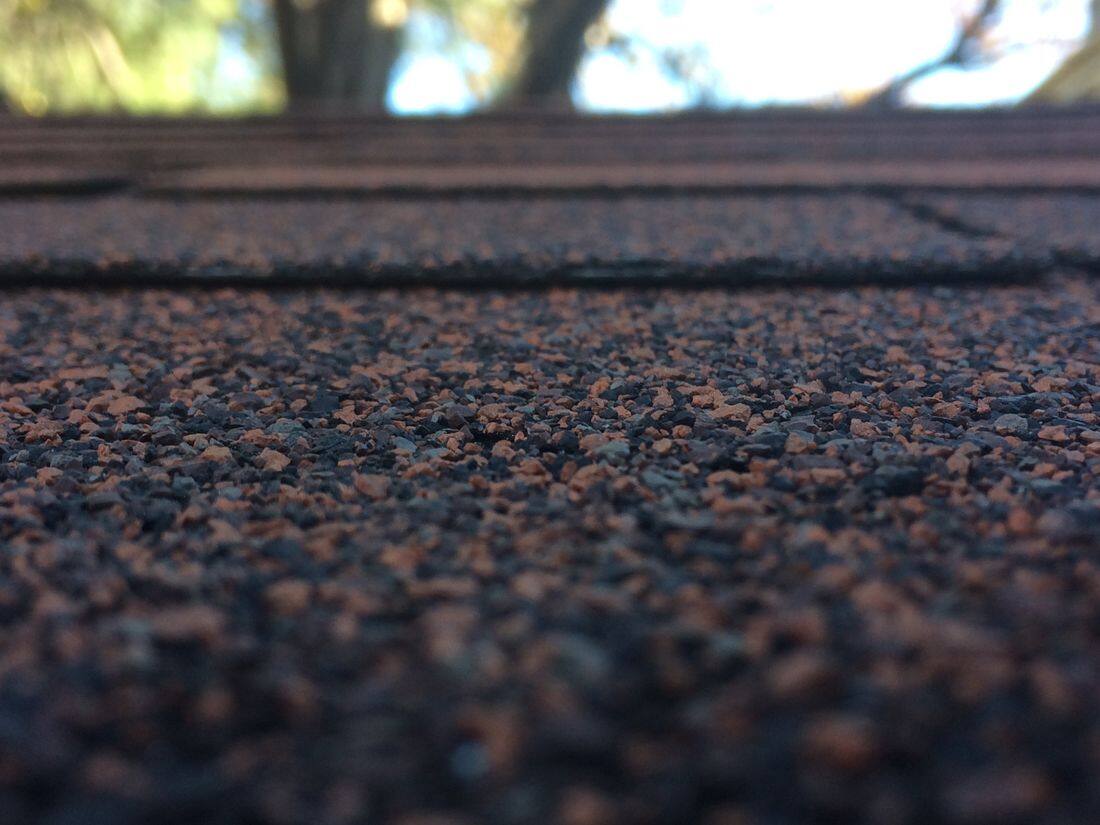 Uniform new architectural shingle field, close up