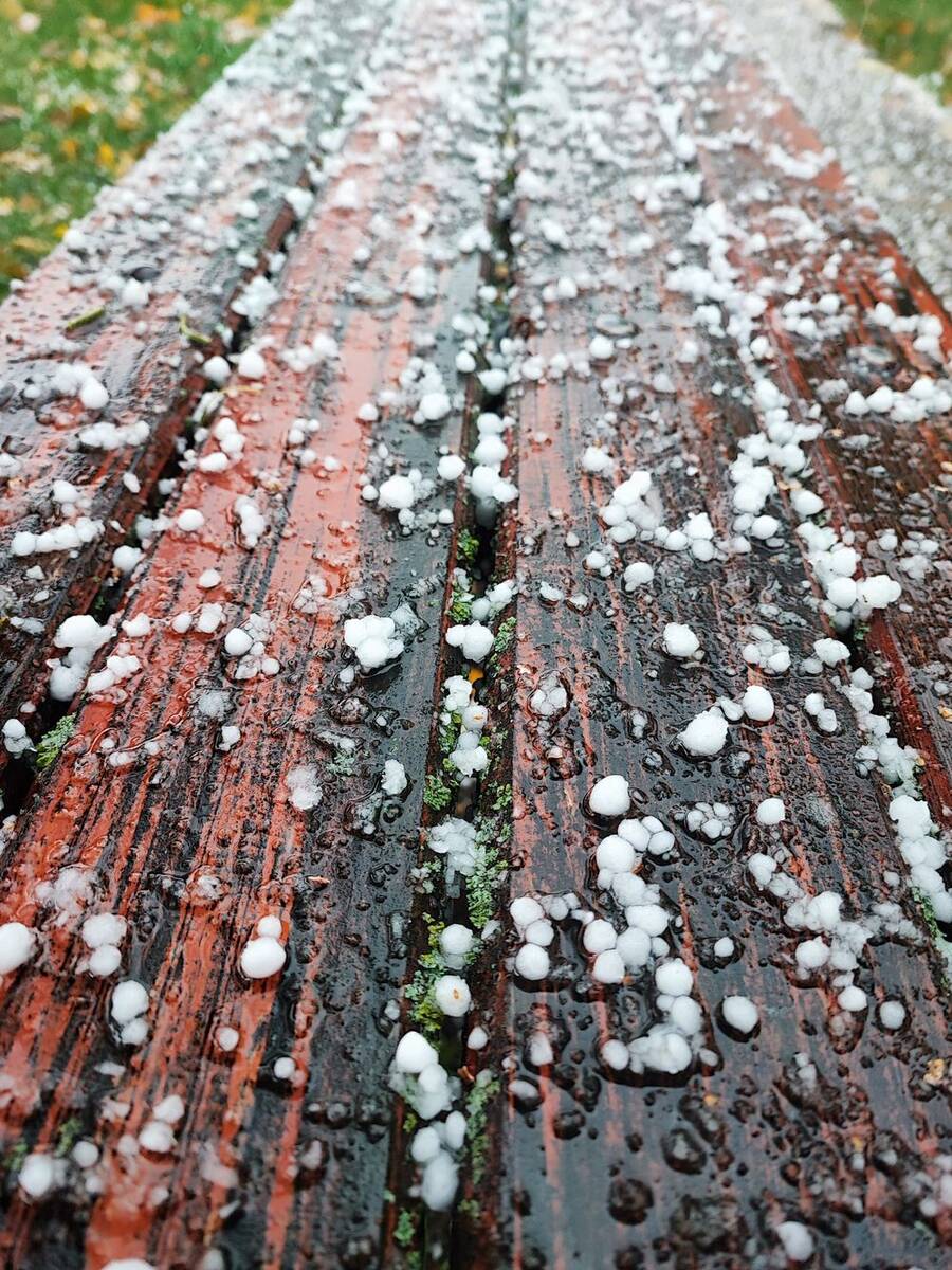 Hailstones scattered across boards after an Oklahoma storm